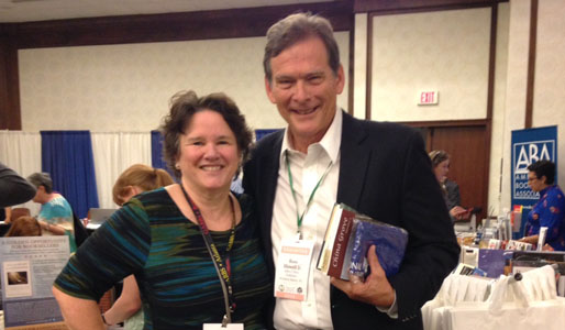 Forsaken author Ross Howell Jr and SIBA Executive Director Wanda Jewell celebrates SIBA's 40th anniversary