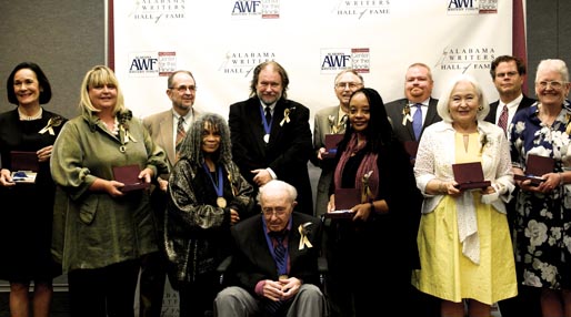 At the Alabama Writers Hall of Fame induction ceremony, from left: Cathy Randall (for Harper Lee); Keller Johnson Thompson (for Helen Keller); Bert Hitchcock (for Johnson Jones Hooper); Sonia Sanchez; Andrew Glaze; Rick Bragg; John Jeter (for Sena Jeter Naslund); Valerie Boyd (for Zora Neale Hurston); Paul Devlin (for Albert Murray); Kathleen Thompson (for Helen Norris Bell); Edward Russell March III (for William March); Mary Lou Meaher (for Augusta Jane Evans Wilson). Photo by Elizabeth Wyngarden Limbaugh.